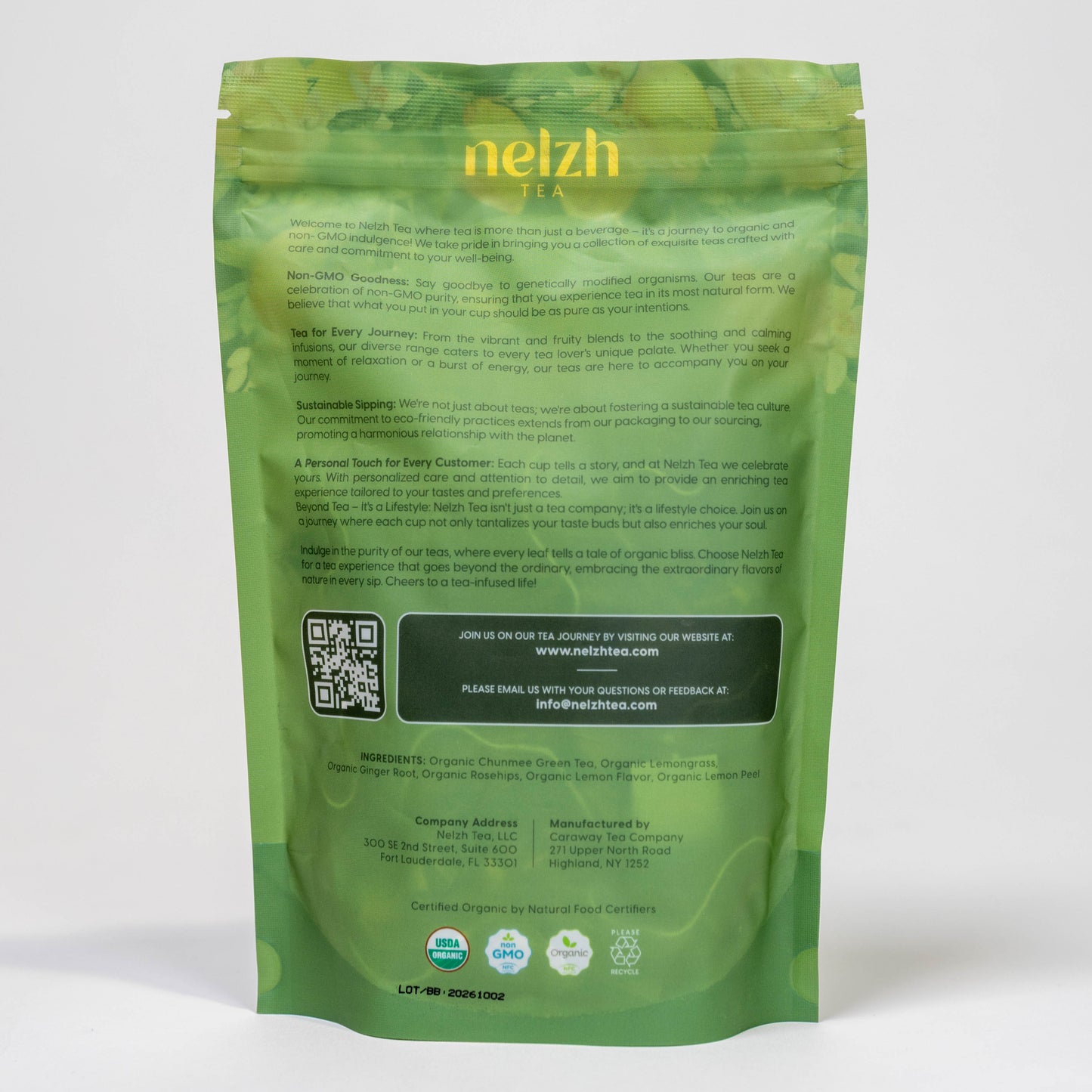The back of the Nelzh Tea Organic Lemon Green Zen bag, displaying a list of ingredients including organic green tea, lemongrass, and ginger root.