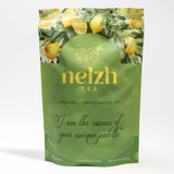 Nelzh Tea Organic Lemon Green Zen, a pouch of 20 tea sachets with 14-25mg of caffeine.