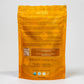 The back of the Nelzh Tea Organic Chamomile Apricot Dream Delight pouch, with a list of ingredients including organic chamomile, organic licorice root, and organic apricot flavor.