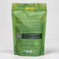 The back of the Nelzh Tea Organic Lemon Green Zen bag, displaying a list of ingredients including organic green tea, lemongrass, and ginger root.