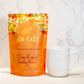 Nelzh Tea Organic Mango Peach Bliss, a pouch of 20 caffeine-free tea sachets with a sweet mango and peach flavor.