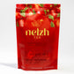 Nelzh Tea Organic White Tea, Apple Sensation, in a sealed bag containing 20 sachets of naturally flavored white tea.