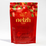 Nelzh Tea Organic White Tea, Apple Sensation, in a sealed bag containing 20 sachets of naturally flavored white tea.